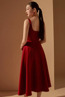 Red Liliana Taffeta U-line midi dress by 21Six, showing its elegant fit and flowing fabric on a model.