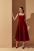 Red Liliana Taffeta U-line midi dress by 21Six, featuring a fitted silhouette and elegant design, shown on a model.