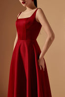 Red Liliana Taffeta U-line dress by 21Six, midi length with a fitted silhouette and subtle sheen, shown on a model.