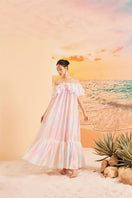 Rainbow Finley shiny silk maxi dress by 21Six, featuring a colorful rainbow pattern and flowing elegant design.
