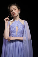 21Six Veri Peri Dalia silk cut-out gown, elegant maxi dress with stylish cut-outs, flowing fabric, and vibrant Veri Peri color.