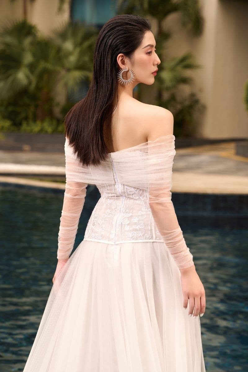 White Marilyn lace mixed tulle off-shoulder midi dress by 21Six, featuring delicate lace details and a flowing tulle skirt.