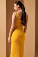 Yellow Jensen crystal bodycon gown by 21Six, showcasing a fitted silhouette with sparkling embellishments and elegant design.