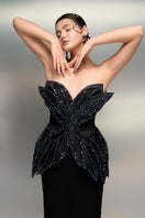 Elegant black Reem silk taffeta gown by 21Six, featuring a flowing silhouette and luxurious fabric for formal occasions.