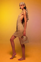 Silvia Gnecchi Luna Chain Bag, top handle design with a sleek leather finish and a gold chain strap.