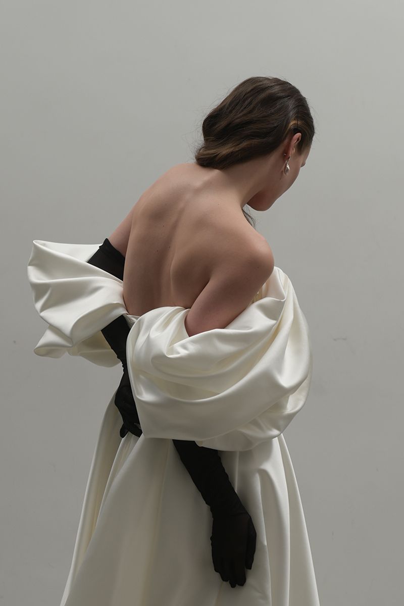 Elegant Off-White Volume Sculpted Gown by Monetre featuring a flowing silhouette and sculptural design in luxurious fabric.