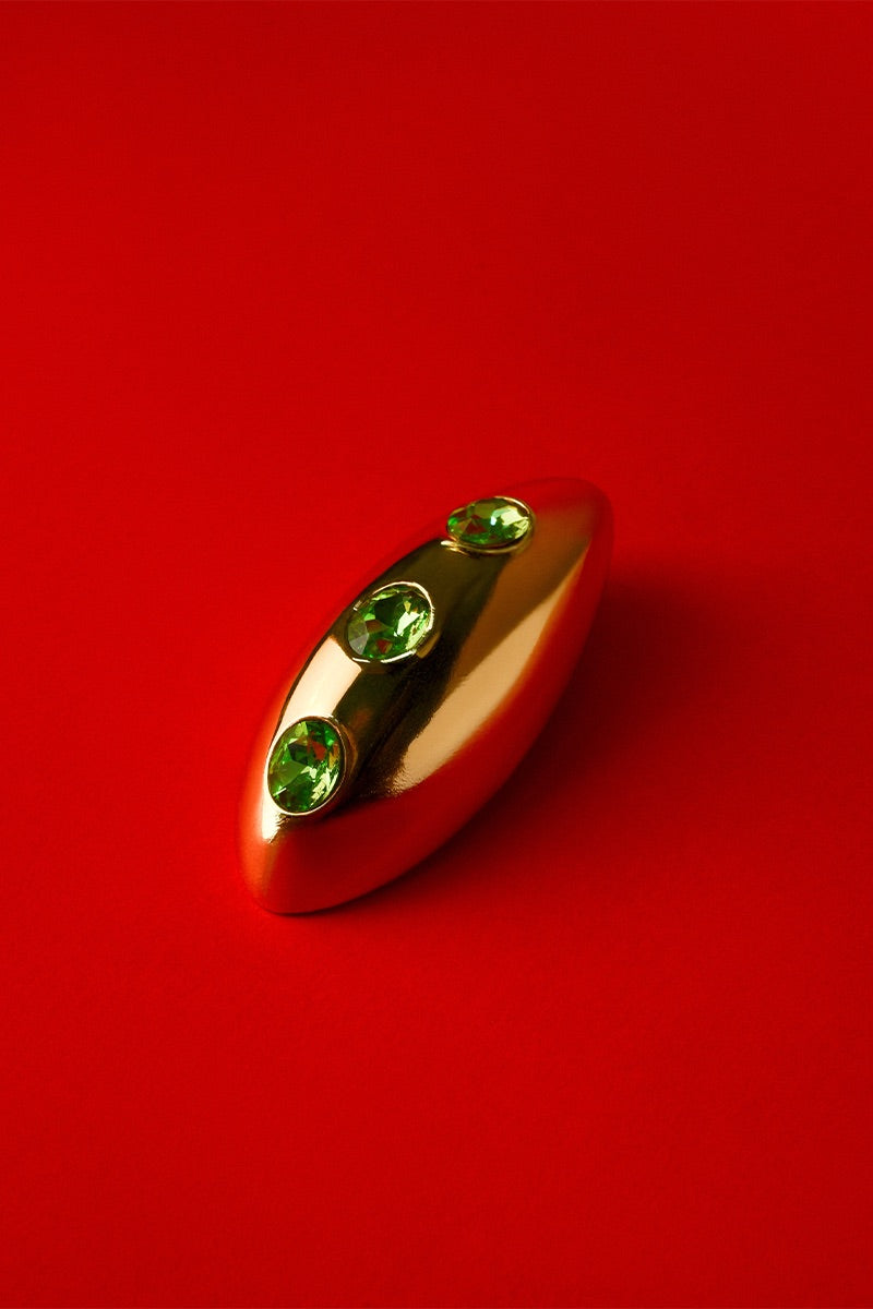 Liya Ocean Eye Green Earrings featuring vibrant green gemstone dangle earrings with silver hooks.
