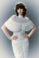 White Plan Brilliant Dress gown featuring elegant design and flowing fabric, perfect for special occasions.