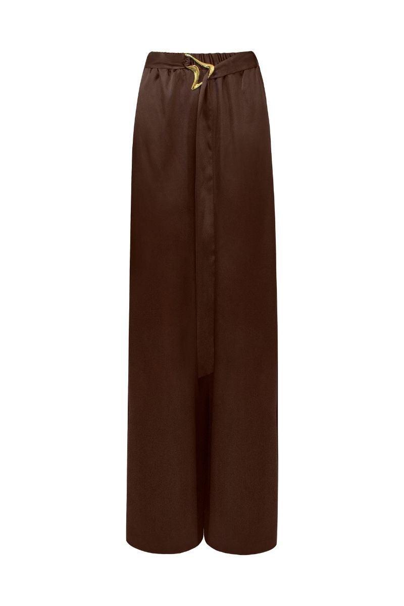 LEDIEL NERU brown pants shown on a model, featuring a relaxed fit and casual style with side pockets.