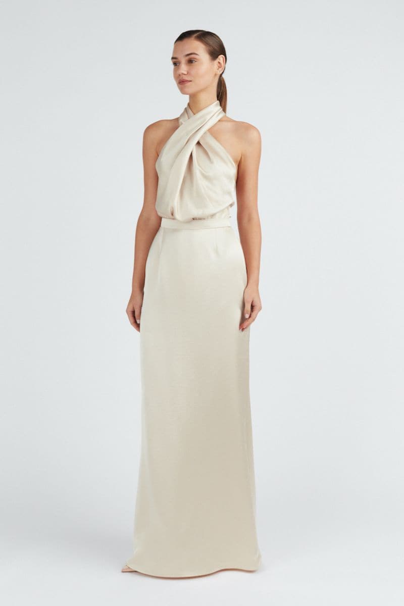 Undress ALIUR champagne halter neck evening dress, a stylish maxi dress with elegant design and flowing fabric.