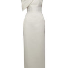 Elegant BAÉ GIGI White Maxi Dress with shoulder bow, flowing fabric and stylish design perfect for summer occasions.