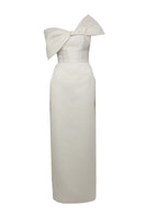 Elegant BAÉ GIGI White Maxi Dress with shoulder bow, flowing fabric and stylish design perfect for summer occasions.