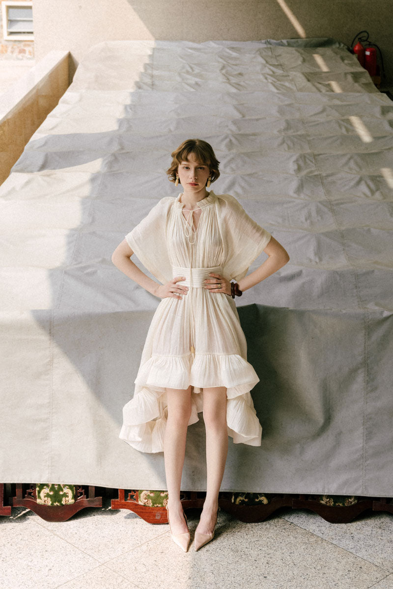 White Plan Gabriella Mini Dress featuring a stylish, fitted design with a sleeveless silhouette and elegant neckline.