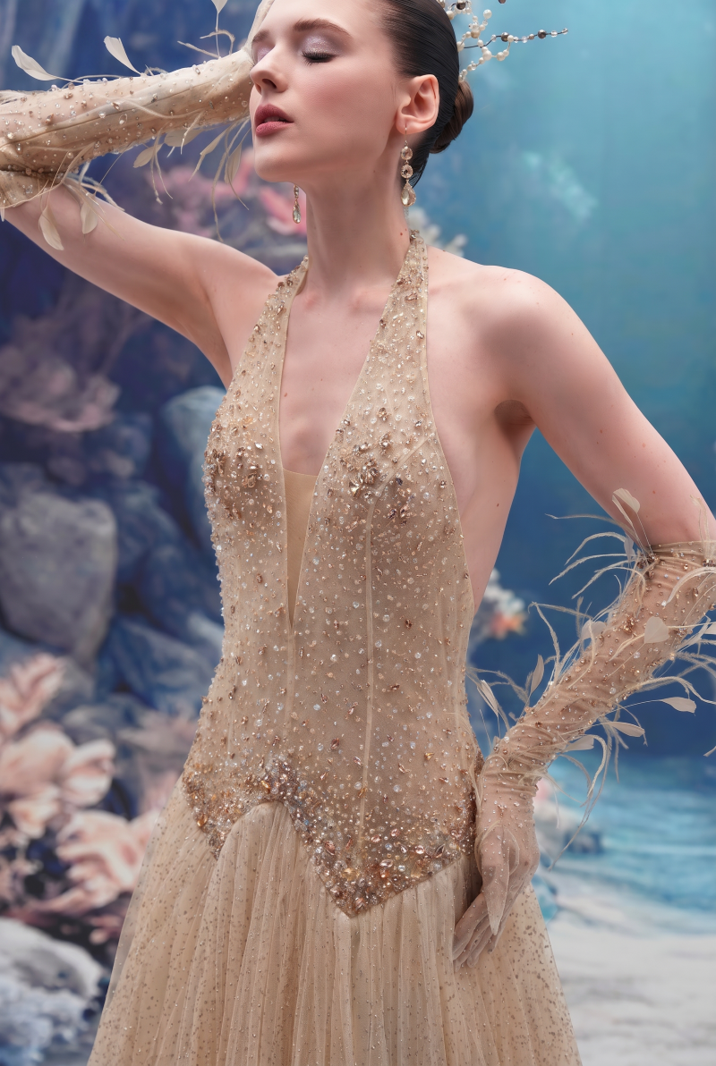 Beige and corisande glitter tulle gown with matching glitter tulle gloves by 21Six, featuring elegant, shimmering fabric and intricate design.