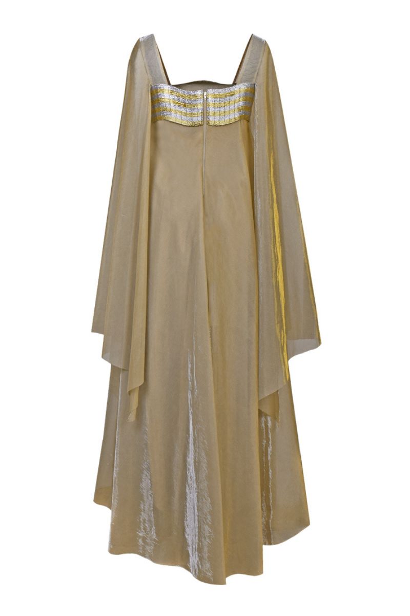 Metallic gold wave bustier kaftan gown by AKHL with flowing fabric and intricate wave pattern, elegant evening wear.