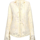 Light yellow Merlette shirt from Summer Away, a stylish women's top with a relaxed fit and soft fabric.