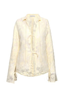 Light yellow Merlette shirt from Summer Away, a stylish women's top with a relaxed fit and soft fabric.