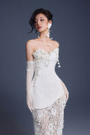 Elegant Keira Tong bouquet corset lace gown featuring intricate lace details and a fitted silhouette.