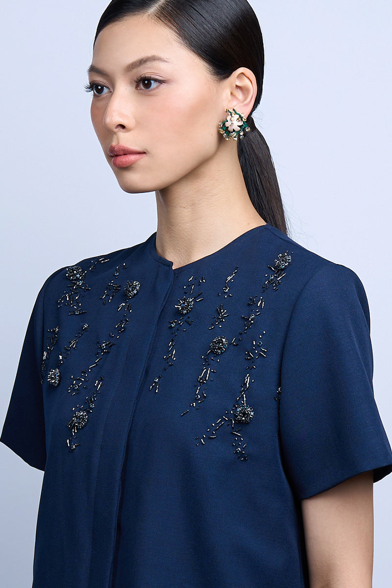 Aidan & Ice Solace Blush Earrings featuring elegant pink earrings with a delicate design and gold accents.