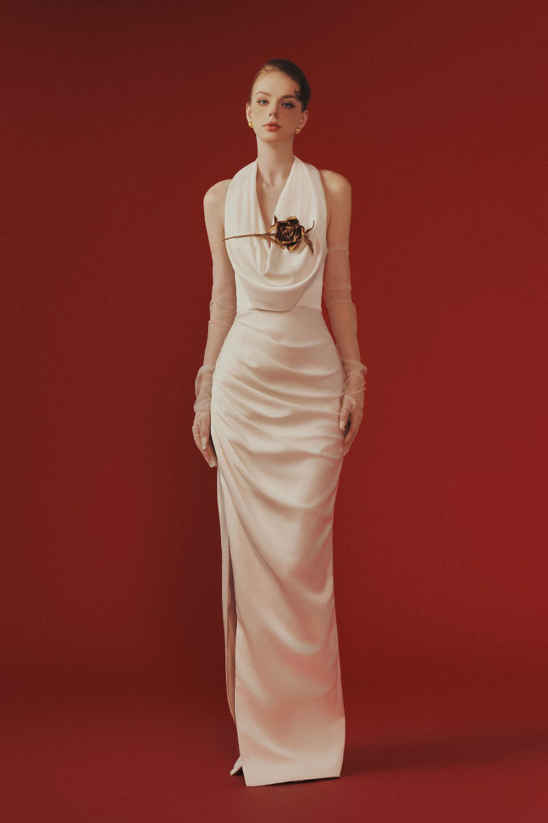 Margée Atelier Hanah maxi dress featuring flowing fabric and elegant design, perfect for summer or special occasions.