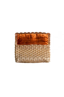 Verdi Kaia seashell clutch in gold and copper with a textured seashell design, gold-tone clasp, and elegant compact shape.