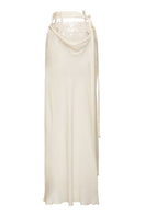 Vaska beige long maxi skirt with matching belt, flowing fabric and elegant design, perfect for casual or formal wear.