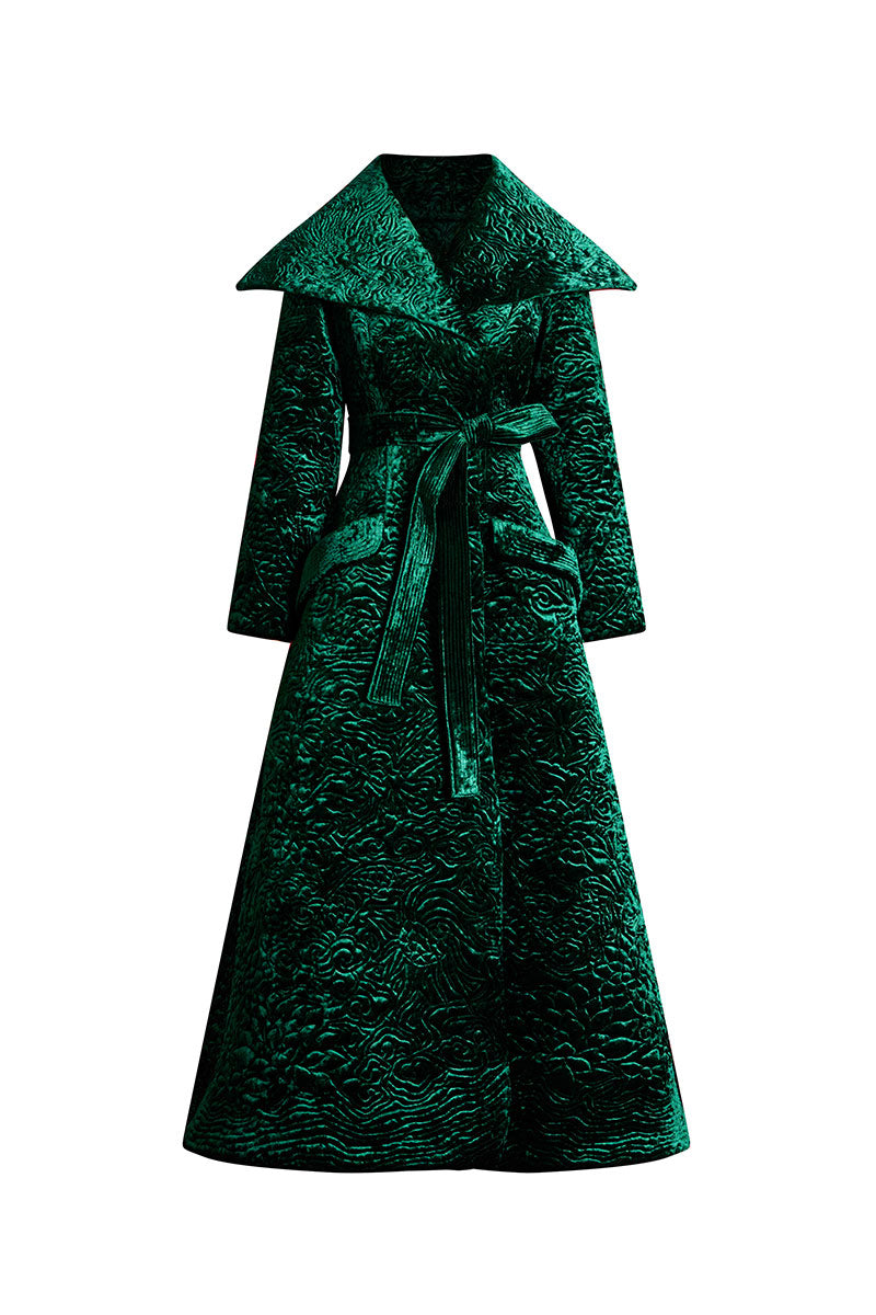 Le Thanh Hoa The Verdant Coat, stylish long coat in green fabric with button details and classic collar, on a hanger.