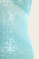 Blue water-themed gown from IKINITA, featuring flowing fabric and elegant design. Perfect for formal occasions and evening wear.