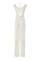 White Scylla dress by IKINITA, elegant gown with flowing fabric and detailed design, perfect for formal occasions.