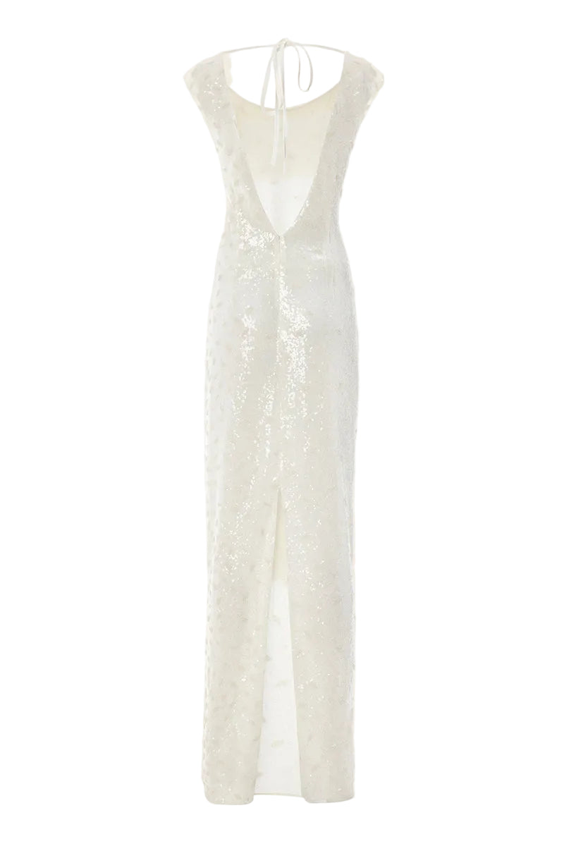 White Scylla dress by IKINITA, elegant gown with flowing fabric and detailed design, perfect for formal occasions.