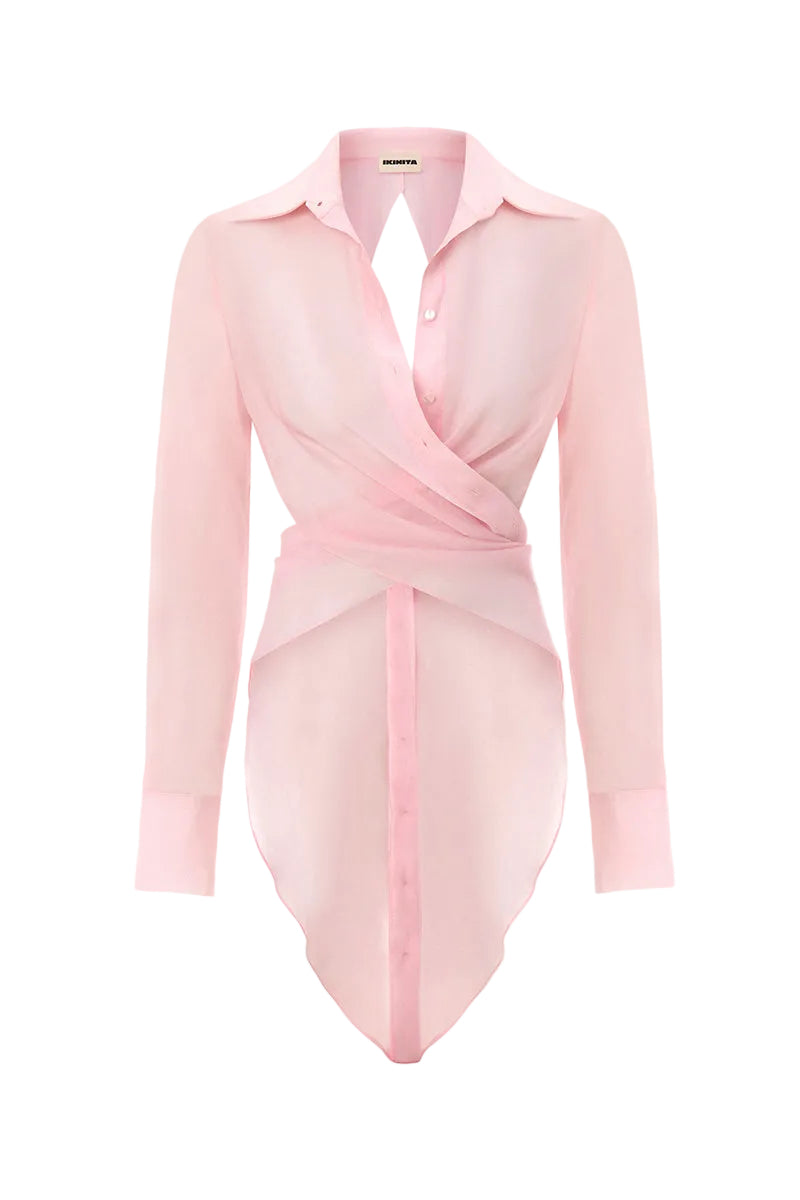 Pink Ulysse shirt by IKINITA, featuring a tailored fit and soft fabric, displayed hanging on a wooden hanger.