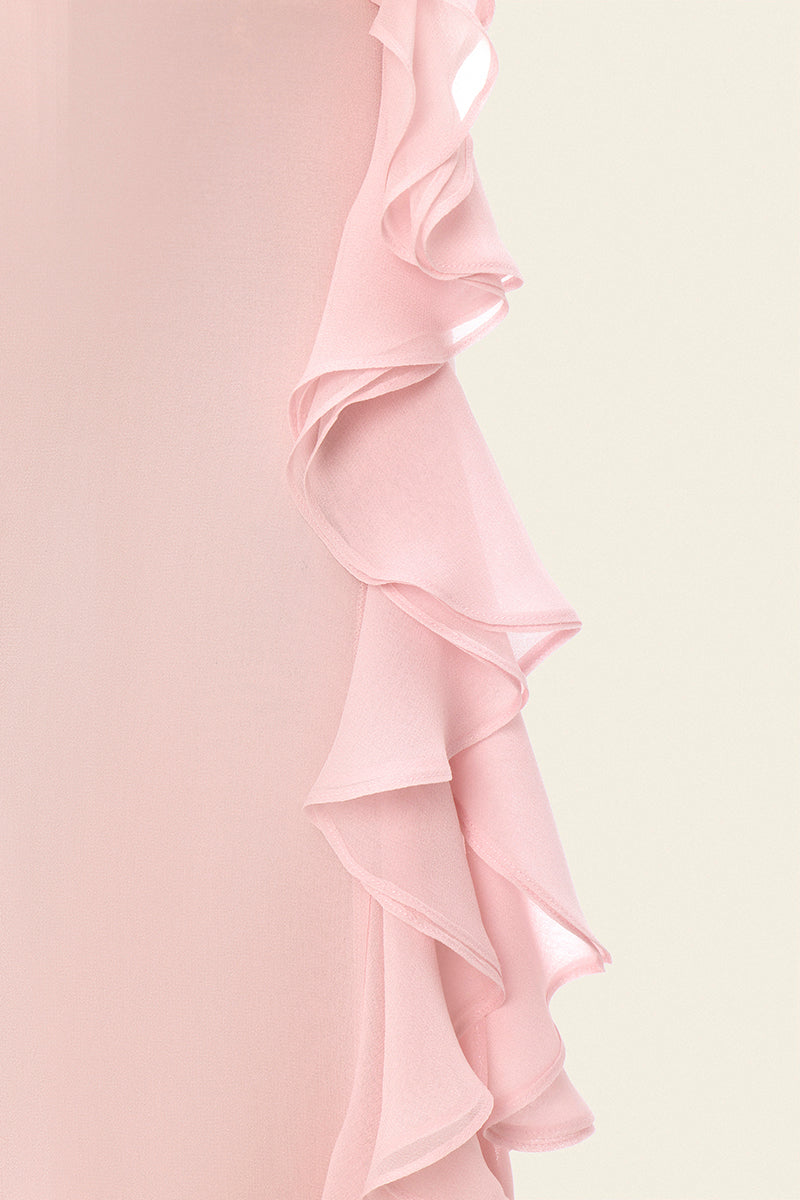 Pink Lotus Eater maxi skirt by IKINITA displayed on a hanger with soft fabric texture and flowing design.