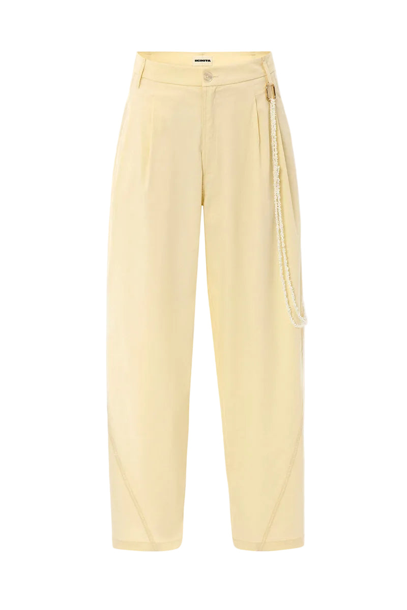 IKINITA ULYSSE yellow pants in butter shade, casual fit with front pockets and belt loops, stylish women's trousers.