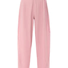 Pink Ulysse pants by IKINITA displayed on a model, showcasing a stylish and comfortable pair of casual pants.