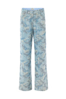 Blue IRIS pants by IKINITA featuring a relaxed fit and stylish design, shown laid flat on a neutral background.
