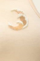 IKINITA WAVE top in sand color, stylish sleeveless blouse with wave design, perfect for casual and summer outfits.