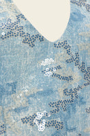 Blue IRIS TOP by IKINITA, stylish women's blouse with a relaxed fit and elegant design, shown in a vibrant blue color.