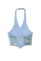 Blue IRIS top by IKINITA, stylish sleeveless blouse with a modern design, perfect for casual or chic outfits.