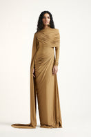 Deme By Gabriella Suze maxi dress in dark beige, flowing fabric with a relaxed fit, showcased on a model.