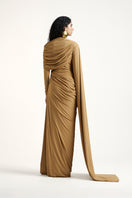 Deme By Gabriella Suze dark beige maxi dress with flowing fabric and sleeveless design, elegant and suitable for formal occasions.