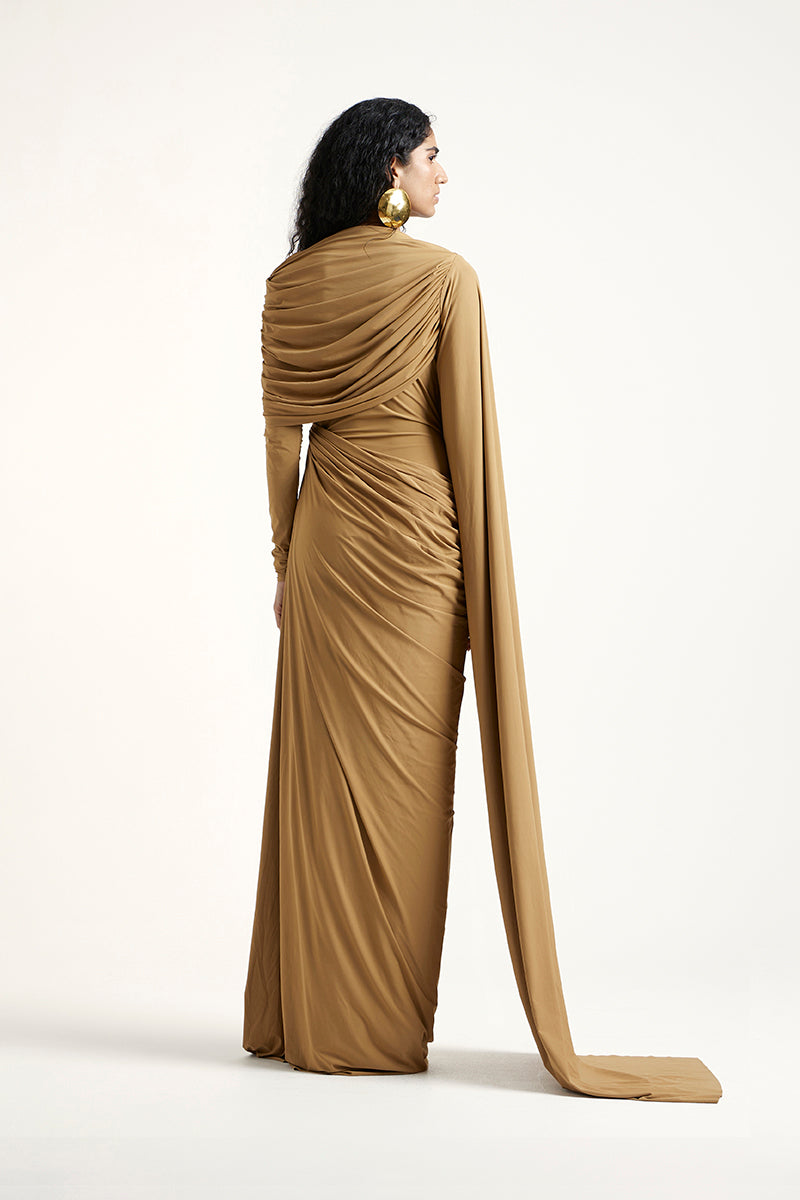 Deme By Gabriella Suze dark beige maxi dress with flowing fabric and sleeveless design, elegant and suitable for formal occasions.