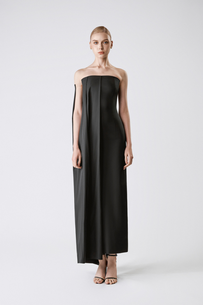 Elegant black Obsidian Flow Maxi Dress by TONYY featuring flowing fabric and a flattering silhouette.
