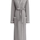 Gray SHELL WOMEN'S WOOL-SILK KNIT ROBE by MANITO, shown hanging on a wooden hook with a cozy, textured knit fabric.