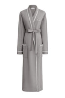 Gray SHELL WOMEN'S WOOL-SILK KNIT ROBE by MANITO, shown hanging on a wooden hook with a cozy, textured knit fabric.
