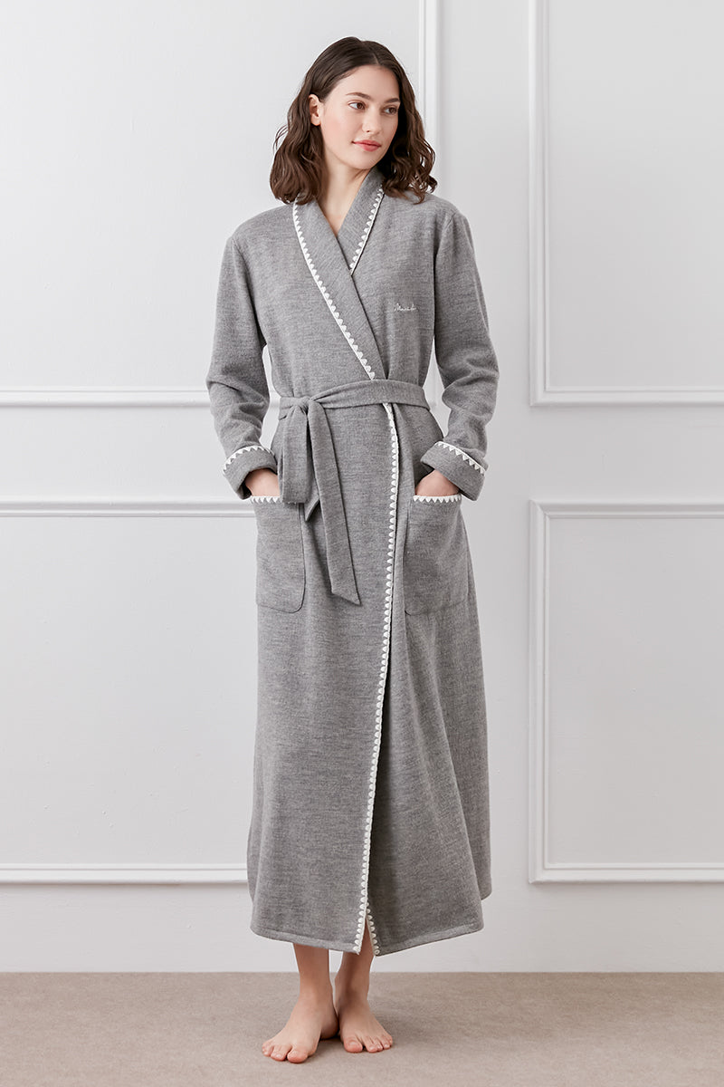 Gray Shell women's wool-silk knit robe by MANITO, soft and cozy, shown hanging with a relaxed fit and textured knit fabric.