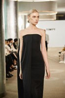 Long black obsidian flow maxi dress by TONYY, featuring a flowing silhouette and elegant design, perfect for formal occasions.