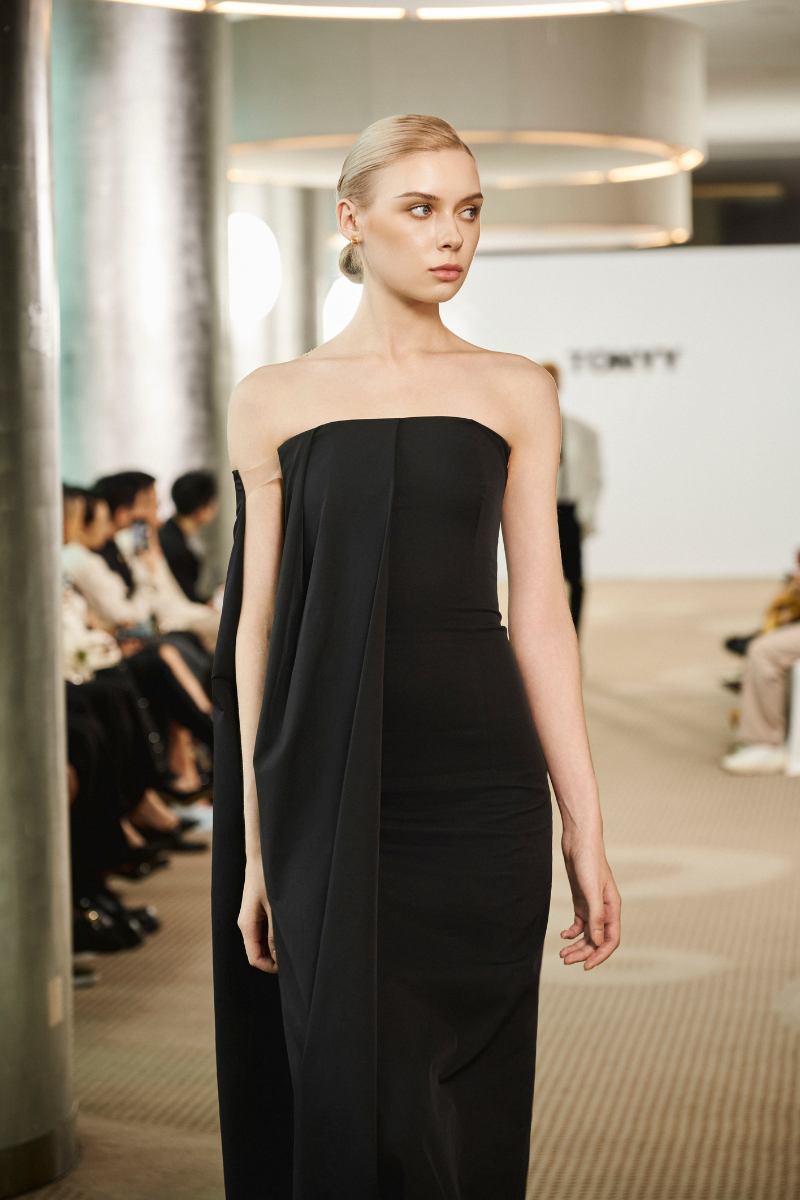 Long black obsidian flow maxi dress by TONYY, featuring a flowing silhouette and elegant design, perfect for formal occasions.