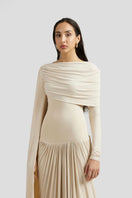 Deme By Gabriella ivory maxi dress with flowing fabric and elegant design, perfect for summer or special occasions.