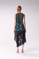 Maccapani Katie multicolor midi dress with a flowing silhouette and vibrant pattern, displayed on a model against a neutral background.