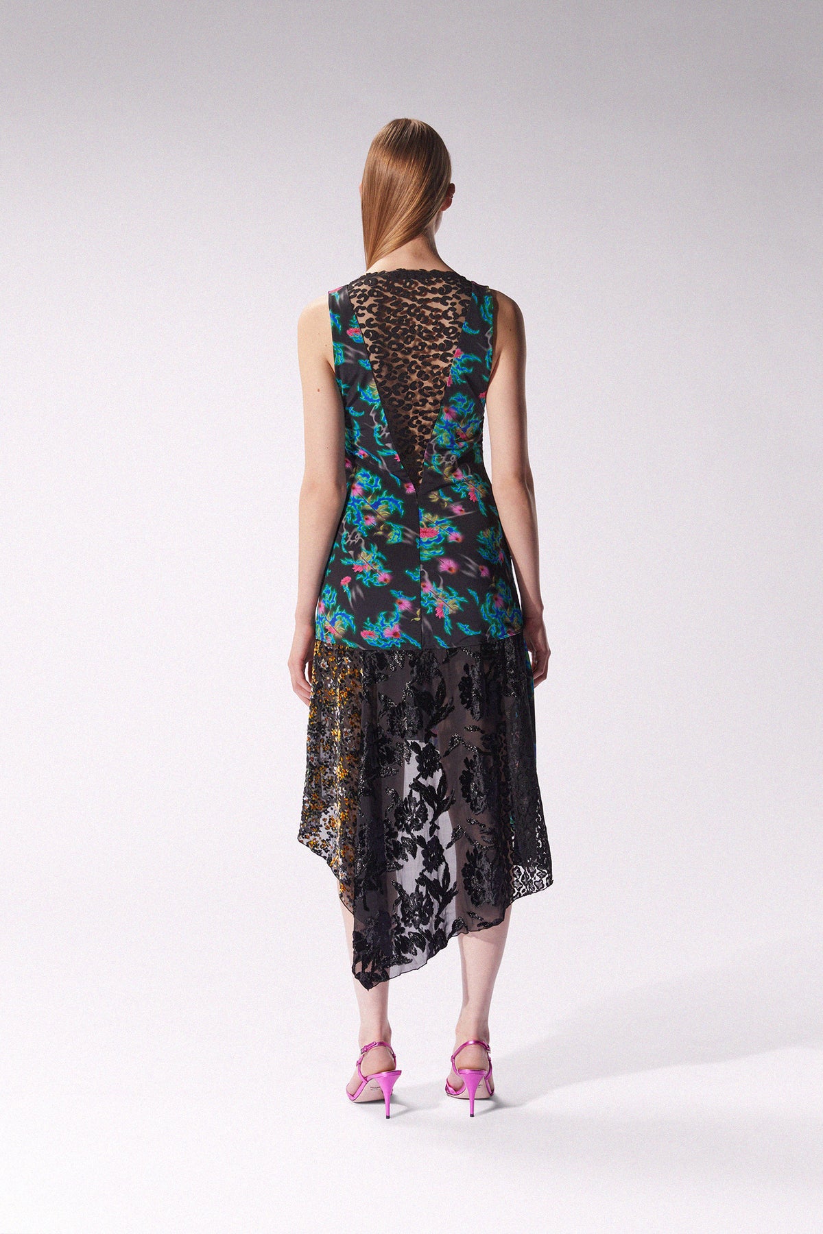 Maccapani Katie multicolor midi dress with a flowing silhouette and vibrant pattern, displayed on a model against a neutral background.